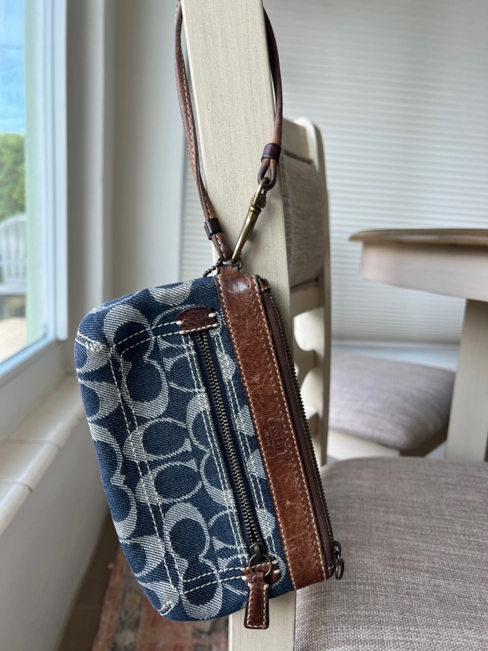 Coach Signature Blue Denim wristlet with brown leather trim